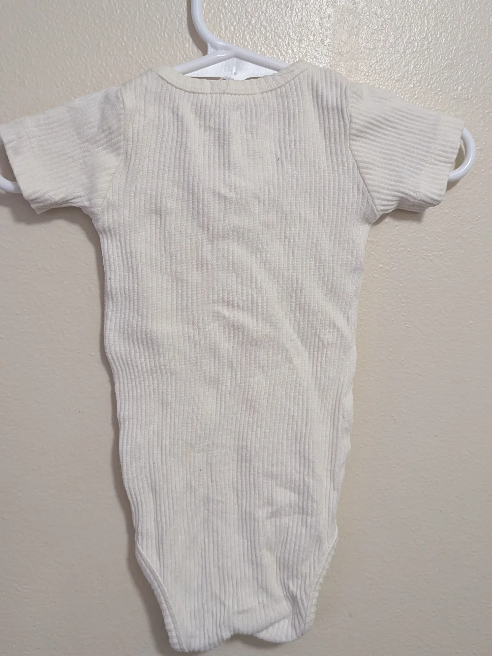 Jamie Kay Cream Ribbed Short-Sleeve One-Piece Bodysuit